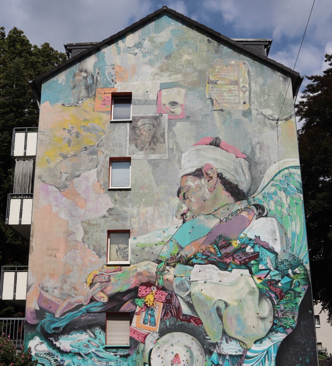 Top Streetart Spots in Köln | Sleeping Sufi von Ammar Abo Bakr Mülheim | Mr. Köln | Foto: Theresa Abdelaziz